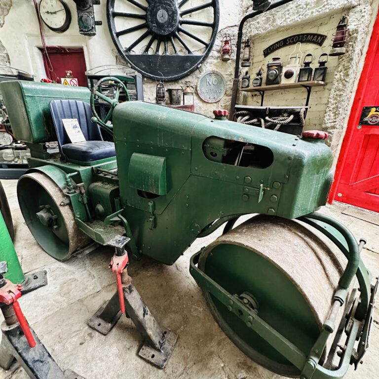 Vintage road roller on display in Rigg's Mill and Motor Museum