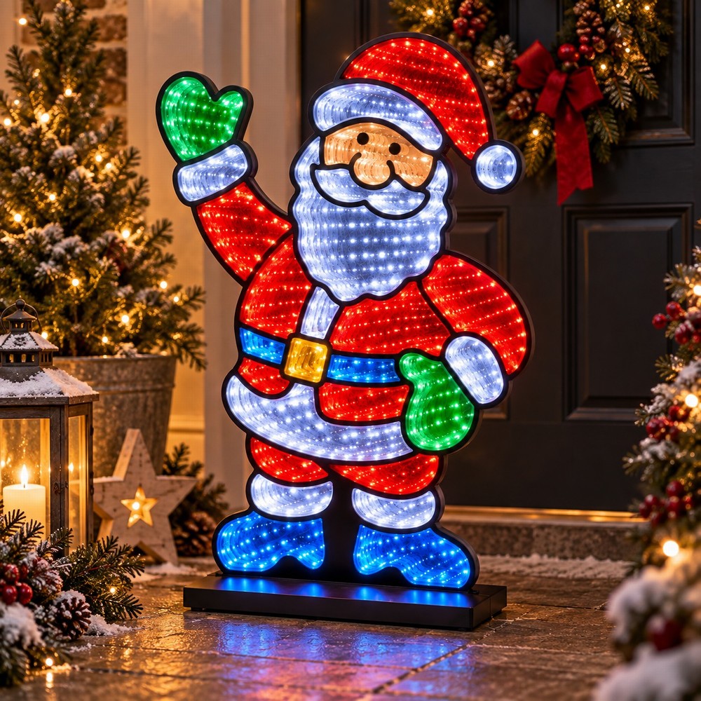 Infinity LED waving Santa outside a house surrounded by christmas decorations