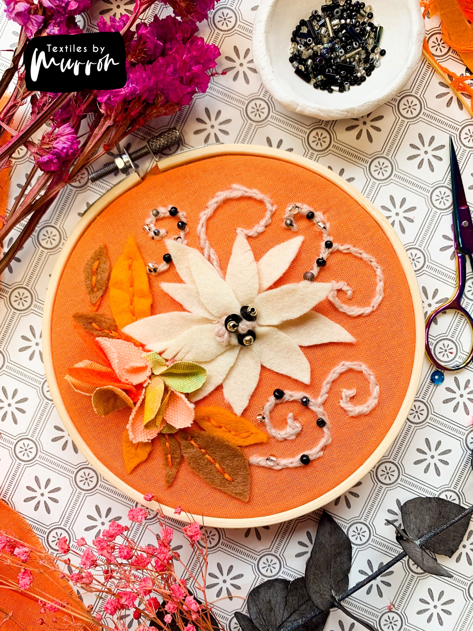 Autumnal Botanical Hoop Art made in the Workshop on a white table